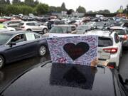 Around 1,500 cars Saturday filled the Town Plaza Center parking lot at  5411 E. Mill Plain Blvd. and the surrounding streets for &quot;Car Rally for Black Lives,&quot; organized by NAACP Vancouver and YWCA Clark County. The rally was held in memory of George Floyd and all the other black lives lost to racism and police brutality.