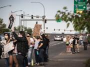 Protesters line Pioneer Street in Ridgefield on Wednesday in the wake of George Floyd&#039;s death and to call for social change.