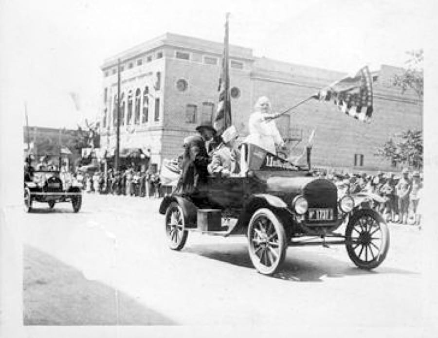 A Fourth of July 1917 parade float moves past Ninth and Main streets in downtown Vancouver.