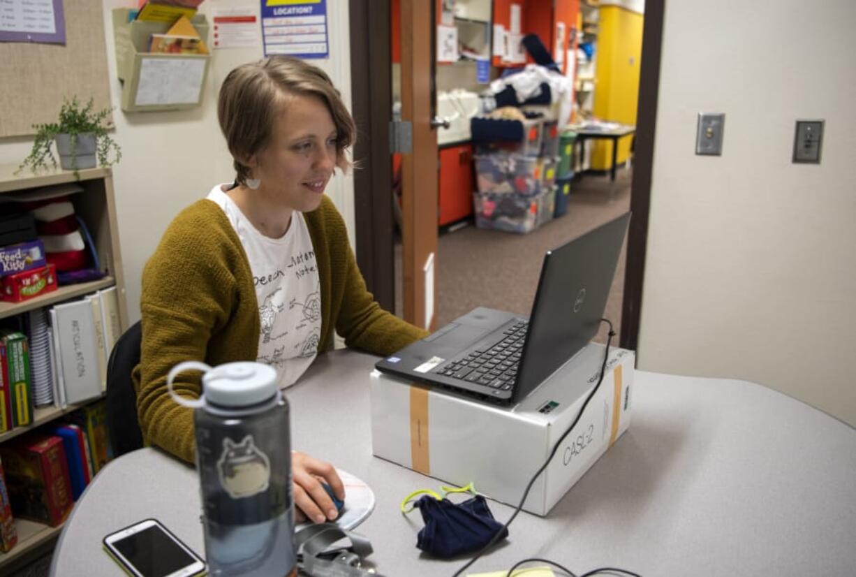 Speech-language pathologist Hillary Betzen waits to connect with a student for a session.