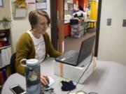 Speech-language pathologist Hillary Betzen waits to connect with a student for a session.