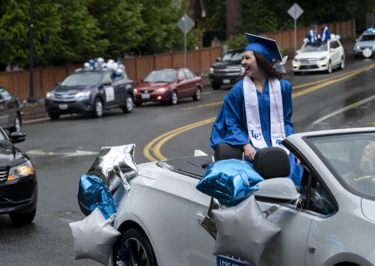 LEAD OPTION: La Center High School graduate Dayna Hines rides through the car parade graduation celebration in La Center, Wash., on June 13, 2020.