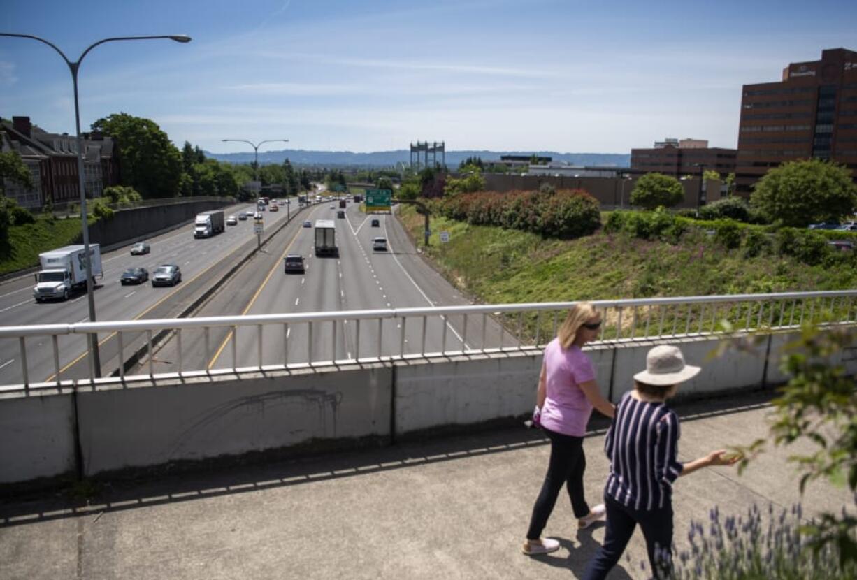 Light traffic moves along Interstate 5 in Vancouver on June 18. Clark County is seeing some air-quality benefits from lighter traffic, but they&#039;re being offset by an uptick in backyard burning.