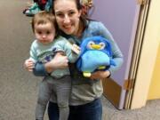 WASHOUGAL: General Federation of Womenis Clubs Camas-Washougal is helping young readers through their Reach for the Stars with Books program, which places books into the hands of preschool students, like Violet Bobrow, pictured with her mother, Brianna Bobrow.