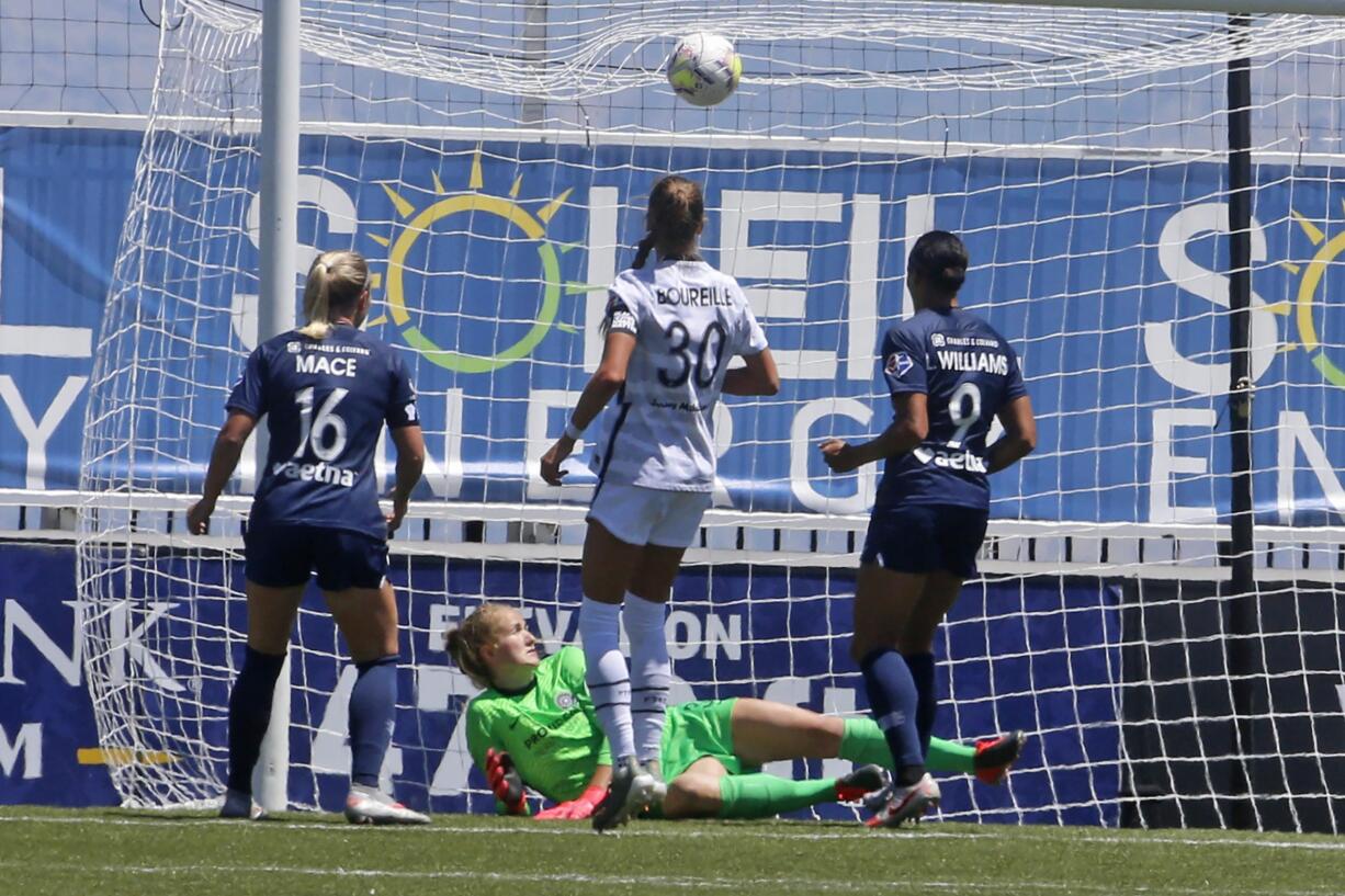 Portland Thorns FC goalkeeper Bella Bixby looks on as North Carolina Courage forward Lynn Williams (9) scores against her during the second half of an NWSL Challenge Cup soccer match at Zions Bank Stadium Saturday, June 27, 2020, in Herriman, Utah.