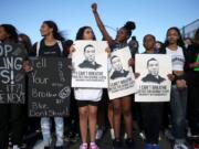 Marchers move west on Burnside towards the Burnside Bridge in Portland, Tuesday evening, June 2, 2020.  Protests continued for a sixth night in Portland, demonstrating against the death of George Floyd, a black man who died in police custody on Memorial Day in Minneapolis.