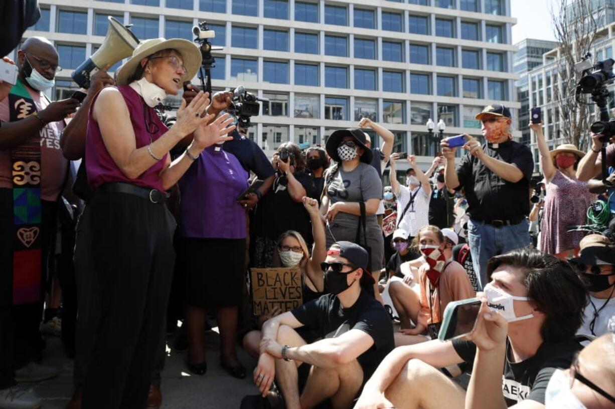 The Rev. Mariann Budde, bishop of the Episcopal Diocese of Washington, speaks Wednesday, June 3, 2020, down the block from St. John&#039;s Church, that is across Lafayette Park from the White House in Washington.