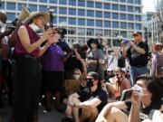 The Rev. Mariann Budde, bishop of the Episcopal Diocese of Washington, speaks Wednesday, June 3, 2020, down the block from St. John&#039;s Church, that is across Lafayette Park from the White House in Washington.