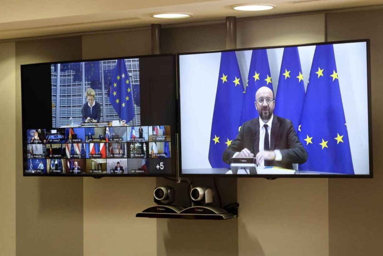 European Council President Charles Michel, right of screen, speaks to EU leaders during an EU summit, in video conference format, at the European Council in Brussels, Friday, June 19, 2020. As they brace for the worst economic downturn since the Great Depression, leaders of the European Union&#039;s member states will discuss on Friday the bloc&#039;s future long-term budget and a multi-billion post-coronavirus recovery plan.