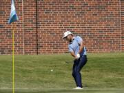 Xander Schauffele chips to the 16th green during the third round of the Charles Schwab Challenge golf tournament at the Colonial Country Club in Fort Worth, Texas, Saturday, June 13, 2020. (AP Photo/David J.