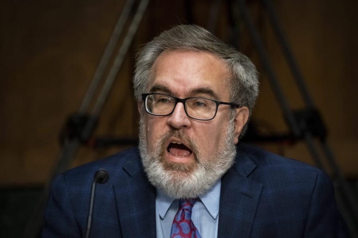 Andrew Wheeler, administrator of the Environmental Protection Agency, listens during a Senate Environment and Public Works Committee oversight hearing to examine the Environmental Protection Agency, Wednesday, May 20, 2020 on Capitol Hill in Washington.