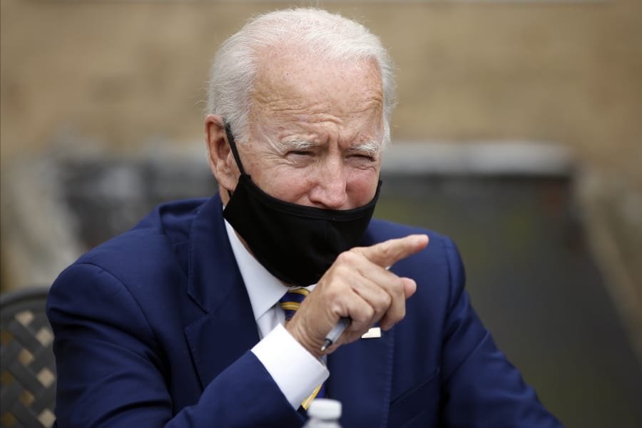 FILE - In this June 17, 2020, file photo, Democratic presidential candidate former Vice President Joe Biden speaks during a meeting with small business owners in Yeadon, Pa. Biden is turning to a quartet of experienced Wisconsin political operatives to lead his campaign in a state that helped deliver President Donald Trump his Electoral College majority four years ago.