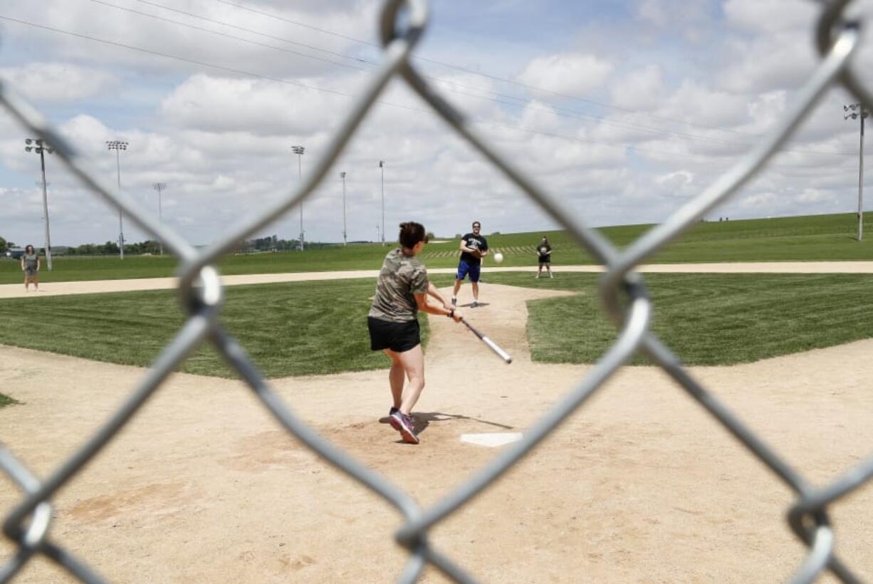 Visitors play on the field at the Field of Dreams movie site, Friday, June 5, 2020, in Dyersville, Iowa. Major League Baseball is building another field a few hundred yards down a corn-lined path from the famous movie site in eastern Iowa but unlike the original, it&#039;s unclear whether teams will show up for a game this time as the league and its players struggle to agree on plans for a coronavirus-shortened season.