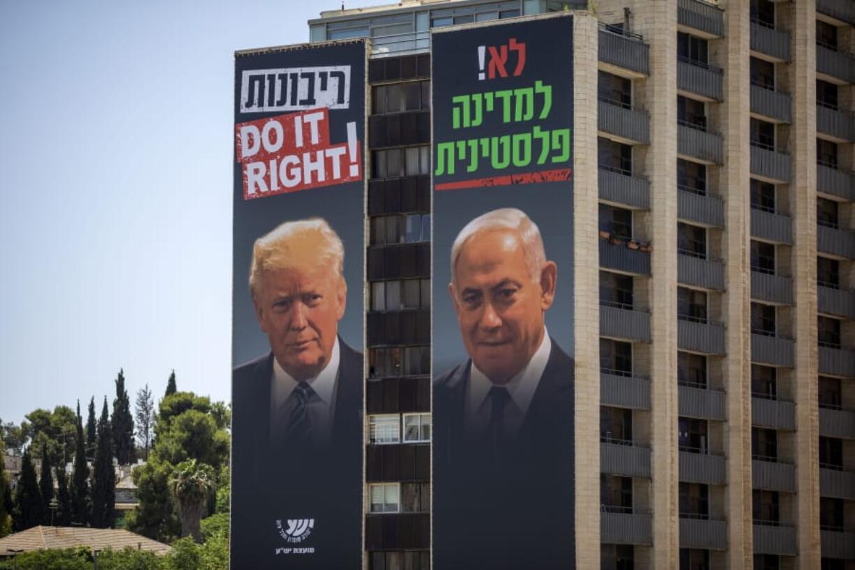 Billboards shows Israeli Prime Minister Benjamin Netanyahu, right, and U.S President Donald Trump in Jerusalem, placed by Yesha Council, an organization of municipal councils of Jewish settlements in the West Bank, Wednesday, June 10, 2020.