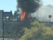 A garbage truck that had caught fire sits on the side of state Highway 500 offramp near Vancouver Mall on Monday morning.