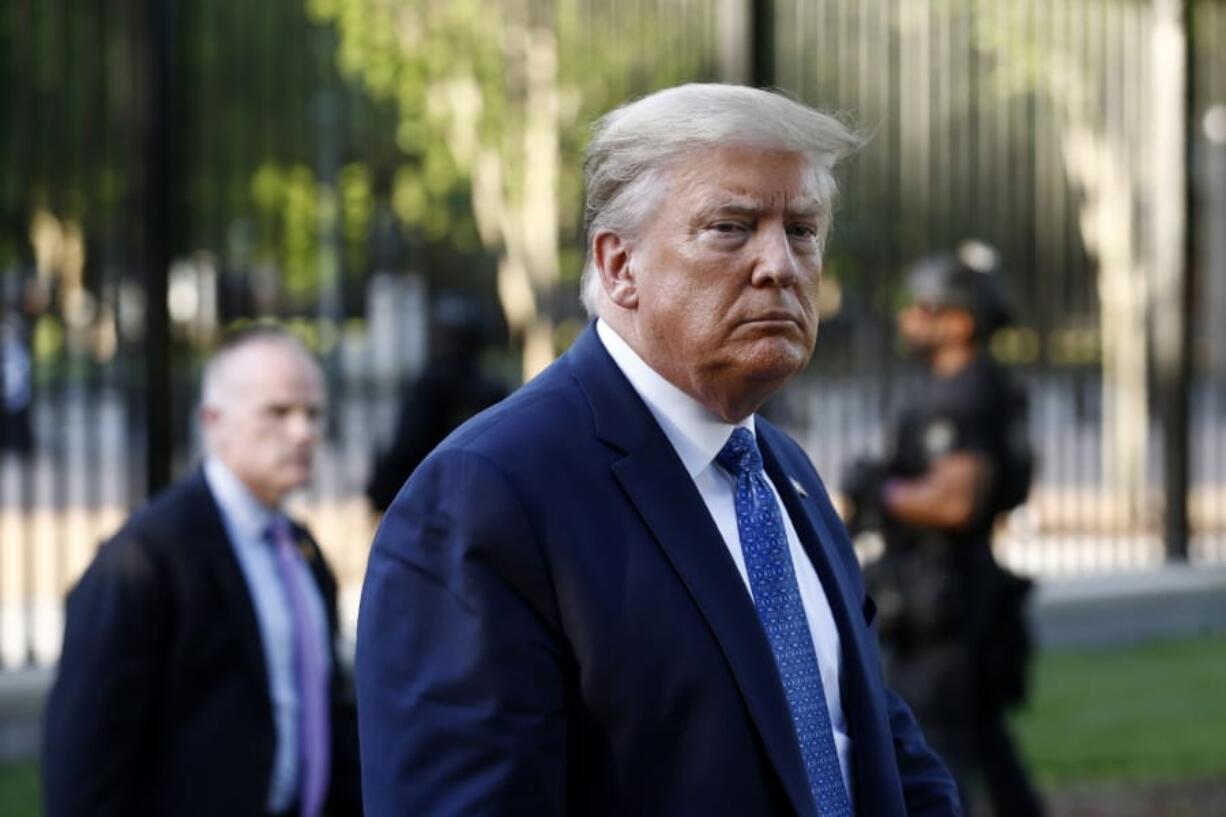 FILE - In this Monday, June 1, 2020, file photo, President Donald Trump returns to the White House in Washington. Trump is traveling to Maine on Friday, June 5, 2020, to visit a company that makes specialized swabs for coronavirus testing.