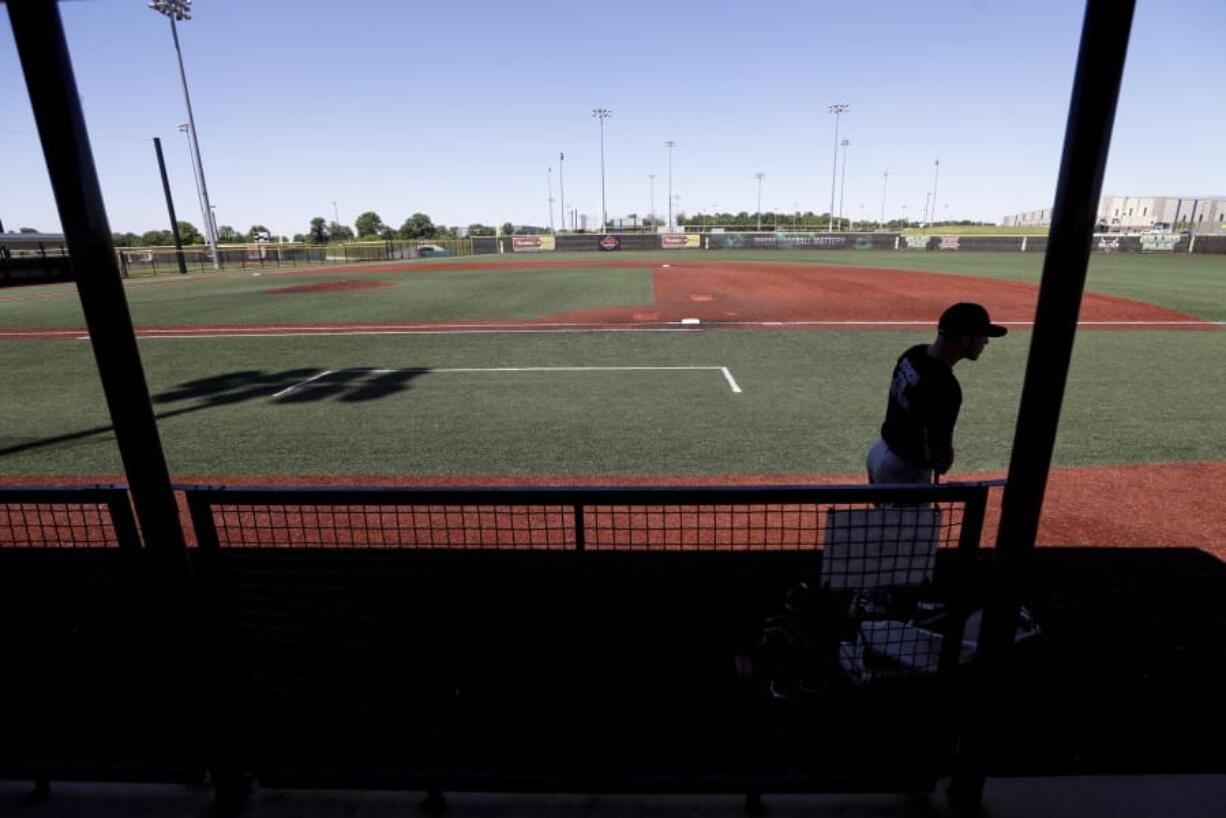 Marshall Rich leaves the field following a workout at Grand Park, Friday, June 12, 2020, in Westfield, Ind. Proceeds from the event will go to Reviving Baseball in the Inner City of Indianapolis.