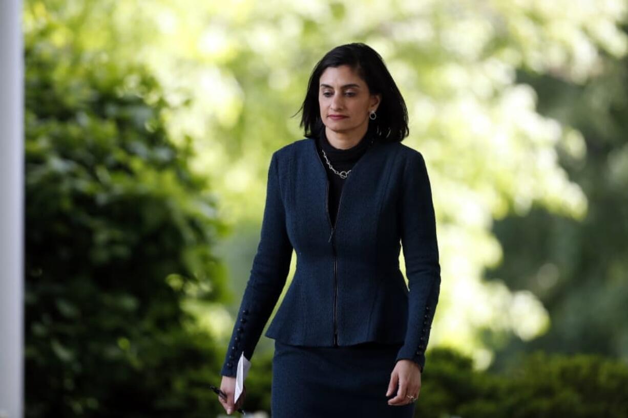 FILE - In this April 27, 2020, file photo Administrator of the Centers for Medicare and Medicaid Services Seema Verma walks to the Rose Garden to attend a briefing with President Donald Trump about the coronavirus in the Rose Garden of the White House in Washington. Federal health authorities have received reports of nearly 26,000 nursing home residents dying from COVID-19, according to materials prepared for the nation&#039;s governors. Verma says states should use &quot;extreme caution&quot; before reopening nursing homes to visitors.