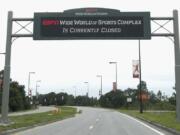 A sign at the entrance to ESPN&#039;s Wide World of Sports at Walt Disney World is seen Wednesday, June 3, 2020, in Kissimmee, Fla. The NBA is set on restarting its season with a 22-team plan at Disney.