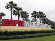 A sign marking the entrance to ESPN&#039;s Wide World of Sports at Walt Disney World is seen Wednesday, June 3, 2020, in Kissimmee, Fla. The NBA has told the National Basketball Players Association that it will present a 22-team plan for restarting the season at Disney.