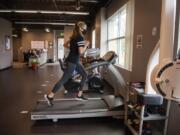 Columbia River graduate Jordan Ryan warms up during physical therapy at ProActive fitness in Vancouver on June 30, 2020. Ryan tore her ACL in March and has been working on physical therapy since her surgery to bring her back to full health.