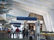 High ceilings and distinctive artwork by Jacob Hashimoto are just a couple of the features of the new section of Concourse E at Portland International Airport, which opened for travel on Wednesday. The extension gives travelers six more gates and is the new home for Southwest Airlines.