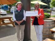 BAGLEY DOWNS: Becky O&#039;Donnell, president of the Clark County Newcomers Club, donates a check for $4,748.52 to Gail Czech, president of Friends of Hospice.