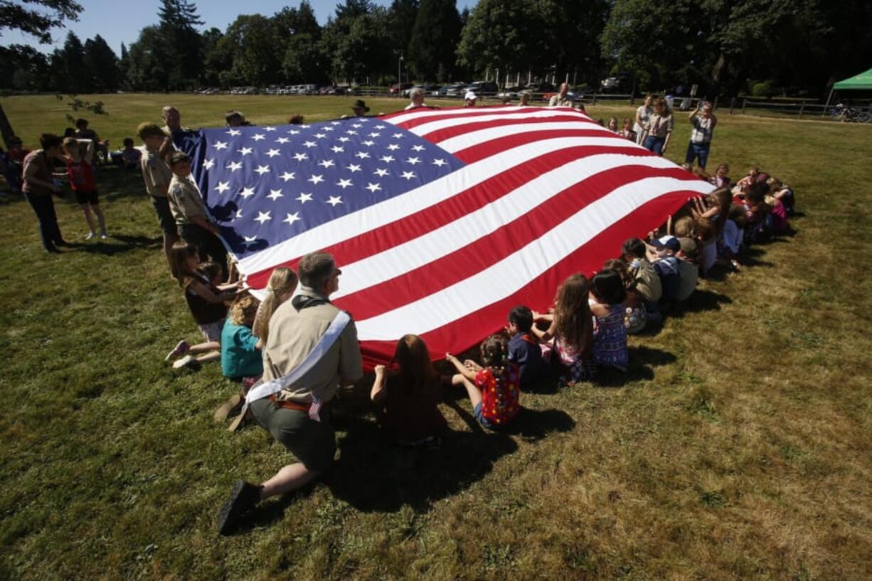 Fort Vancouver celebrates the U.S. flag during the annual Fort Vancouver National Trust Flag Day.