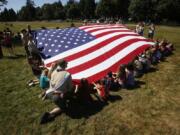 Fort Vancouver celebrates the U.S. flag during the annual Fort Vancouver National Trust Flag Day.