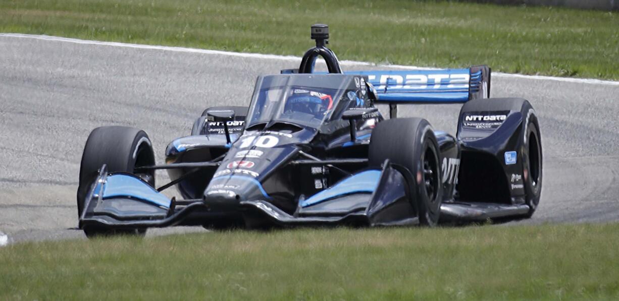 IndyCar driver Felix Rosenqvist (10) corners on Turn 3 during the REV Group Grand Prix auto race Sunday, July 12, 2020, at Road America in Elkhart Lake, Wis. (Gary C.