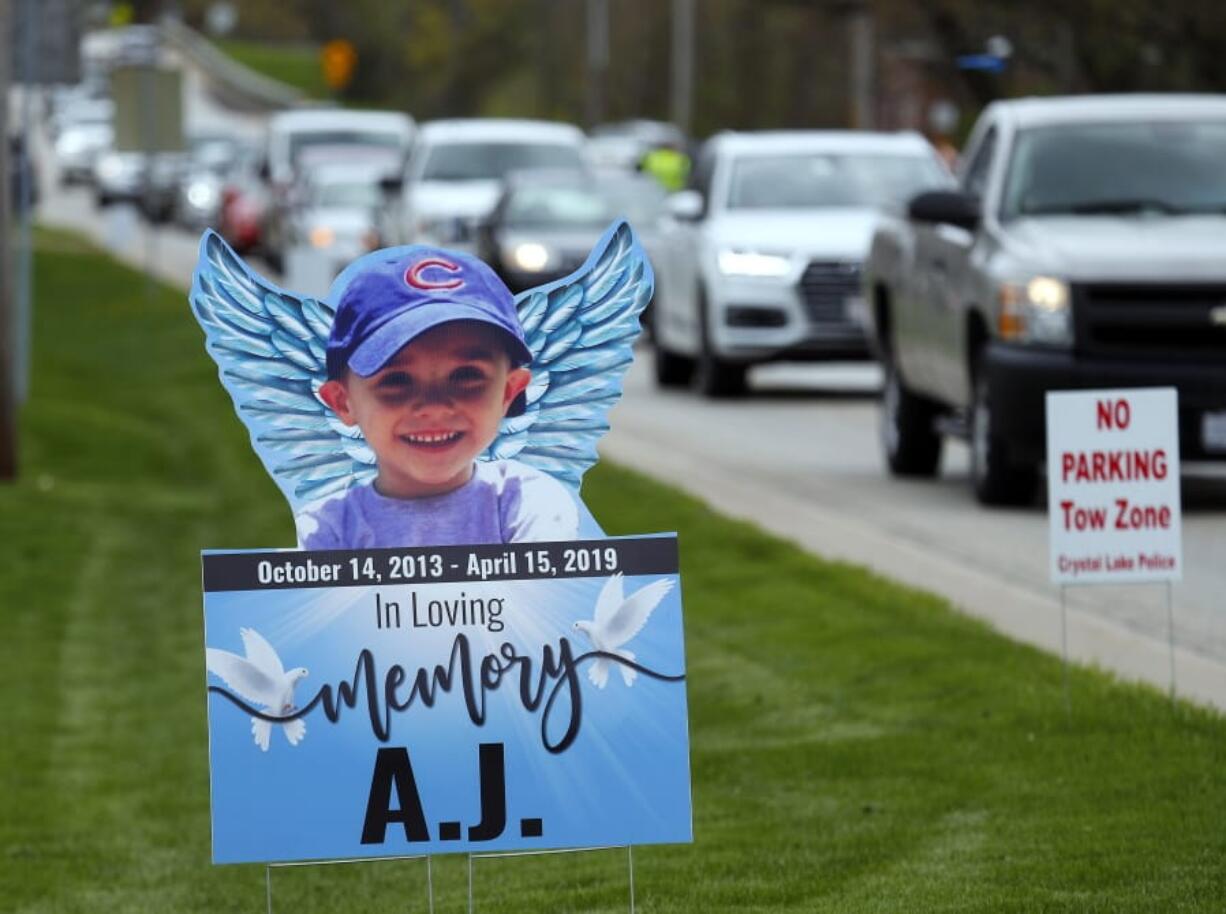 FILE - In this May 3, 2019, file photo, cars line up as mourners head to visitation services for AJ Freund at Davenport Funeral Home in Crystal Lake, Ill. McHenry County Judge Robert Wilbrandt ruled Tuesday, July 14, 2020, that media must not publish or broadcast images of autopsy photographs of the 5-year-old boy during the sentencing hearing of his mother, who has pleaded guilty in his murder. Wilbrandt agreed with the prosecutor&#039;s objection to letting the five photographs or videos to be photographed or shown on television as part of the coverage of JoAnn Cunningham&#039;s sentencing that starts Thursday.