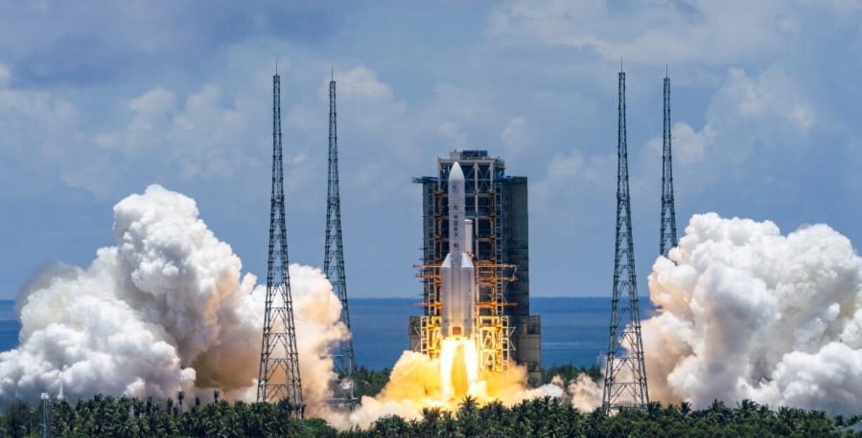 In this photo released by China&#039;s Xinhua News Agency, a Long March-5 rocket carrying the Tianwen-1 Mars probe lifts off from the Wenchang Space Launch Center in southern China&#039;s Hainan Province, Thursday, July 23, 2020. China launched its most ambitious Mars mission yet on Thursday in a bold attempt to join the United States in successfully landing a spacecraft on the red planet.