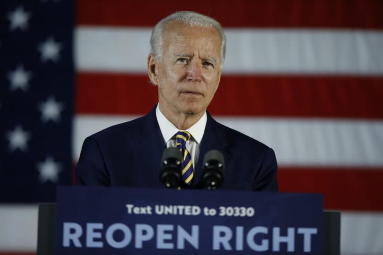 FILE - In this June 17, 2020, file photo Democratic presidential candidate, former Vice President Joe Biden pauses while speaking, in Darby, Pa. Amid a summer of racial unrest and calls for more diversity in leadership, President Donald Trump lags Democratic rival Joe Biden in the percentage of people of color on their campaign staffs, according to data the campaigns provided to The Associated Press.