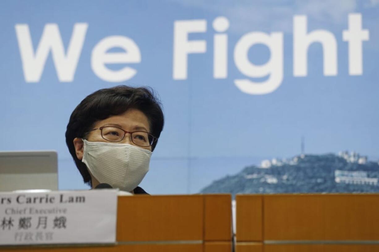 Hong Kong Chief Executive Carrie Lam speaks during a press conference in Hong Kong, Friday, July 31, 2020. She announced to postpone legislative elections scheduled for Sept. 6, citing a worsening coronavirus outbreak.