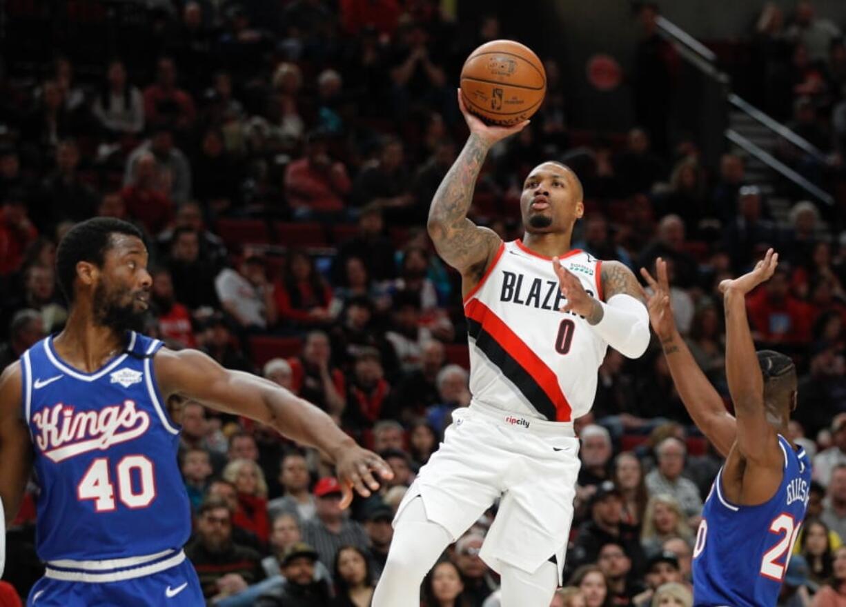 Portland Trail Blazers guard Damian Lillard (0) says he will spend most of his downtime working on recording music while inside the NBA bubble.