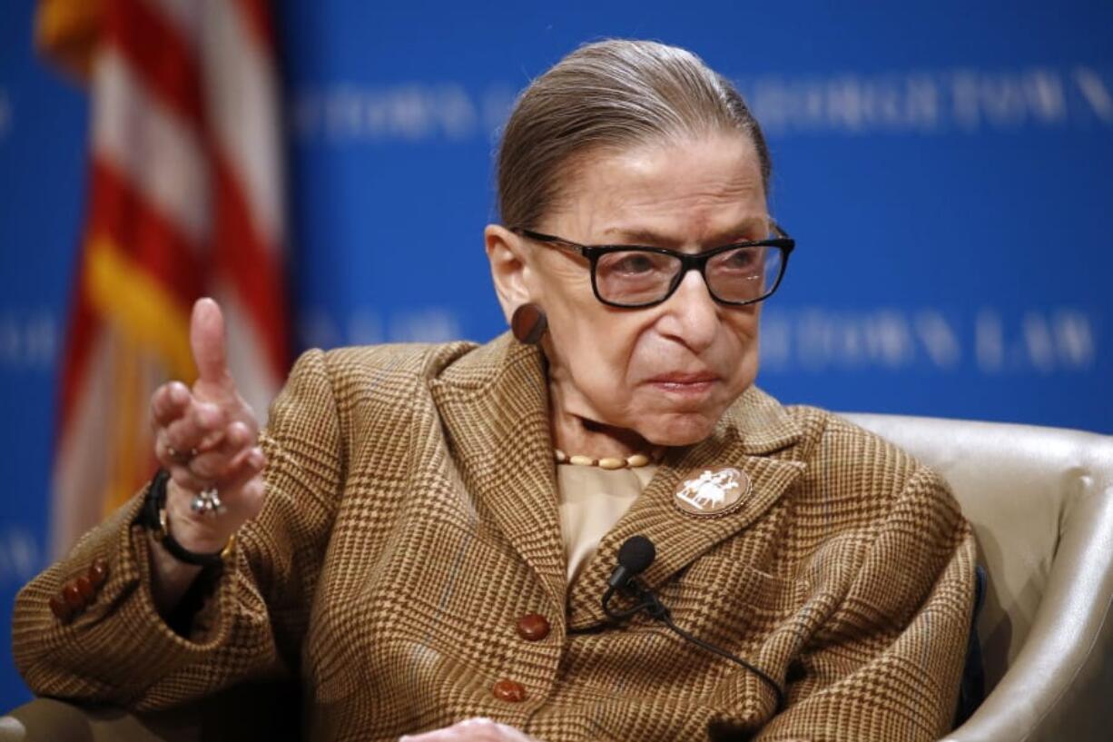 FILE - In this Feb. 10, 2020, file photo U.S. Supreme Court Associate Justice Ruth Bader Ginsburg speaks during a discussion on the 100th anniversary of the ratification of the 19th Amendment at Georgetown University Law Center in Washington.