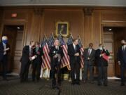 Senate Majority Leader Mitch McConnell of Ky., during a news conference on on Capitol Hill in Washington, Monday, July 27, 2020, to highlight their proposal for the next coronavirus stimulus bill. McConnell is joined by, from left, Sen. John Cornyn, R-Texas, Sen. Lamar Alexander, R-Tenn., Sen. Roy Blunt, R-Mo., Sen. Richard Shelby, R-Ala., Sen. Tim Scott, R-S.C., Sen. Lindsey Graham, R-S.C., and Sen. Mitt Romney, R-Utah.