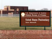 FILE - In this May 16, 2001, file photo, the entrance to the U.S. Penitentiary in Terre Haute, Ind. A Zen Buddhist priest wants a federal judge to stop the execution of a federal death row inmate he&#039;s been counseling and argues he would be put at high risk for the coronavirus if the execution happens this month. Dale Hartkemeyer goes by the religious name Seigen. He filed a lawsuit Thursday in federal court in Indiana. The 68-year-old wants the court to delay Wesley Ira Purkey&#039;s execution until a coronavirus vaccine is available or there&#039;s a widespread effective treatment. Purkey is one of four federal death row inmates scheduled to be executed in July and August.