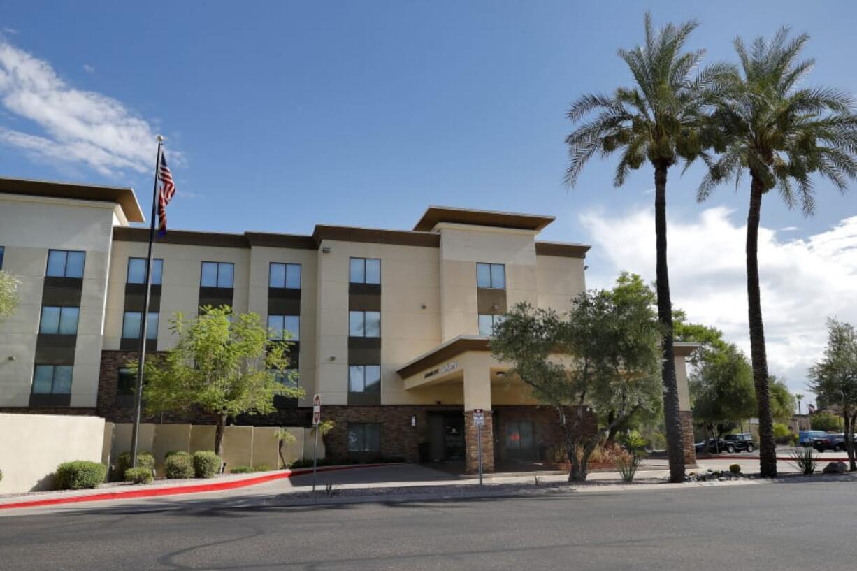 A Hampton Inn is shown Tuesday, July 21, 2020 in Phoenix. The Trump administration is detaining immigrant children as young as 1 in hotels before deporting them to their home countries. Documents obtained by The Associated Press show a private contractor hired by U.S. Immigration and Customs Enforcement is taking children to three Hampton Inns in Arizona and Texas under restrictive border policies implemented during the coronavirus pandemic.