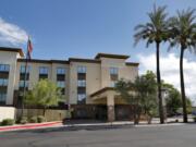 A Hampton Inn is shown Tuesday, July 21, 2020 in Phoenix. The Trump administration is detaining immigrant children as young as 1 in hotels before deporting them to their home countries. Documents obtained by The Associated Press show a private contractor hired by U.S. Immigration and Customs Enforcement is taking children to three Hampton Inns in Arizona and Texas under restrictive border policies implemented during the coronavirus pandemic.