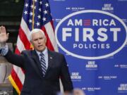 FILE - In this June 12, 2020, file photo Vice President Mike Pence, waves as he arrives to speak after a tour at Oberg Industries plant in Sarver, Pa. As the public face of the administration&#039;s coronavirus response. Vice President Mike Pence has been trying to convince Americans that the country is winning even as cases spike in large parts of the country. For public health experts, that sense of optimism is detached from reality.