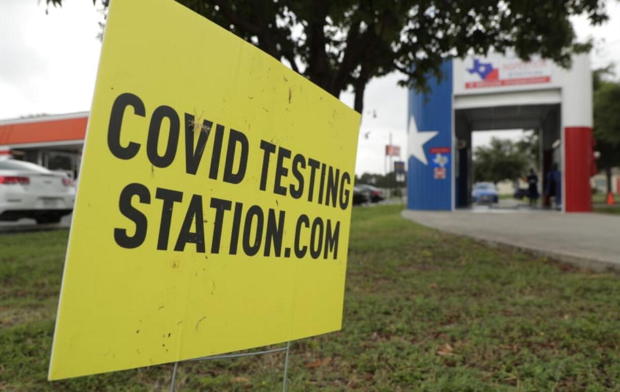 COVID-19 antibody testing and diagnostic testing are administered at a converted vehicle inspection station, Tuesday, July 7, 2020, in San Antonio. Local officials across Texas say their hospitals are becoming increasingly stretched and are in danger of becoming overrun as cases of the coronavirus surge.