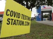 COVID-19 antibody testing and diagnostic testing are administered at a converted vehicle inspection station, Tuesday, July 7, 2020, in San Antonio. Local officials across Texas say their hospitals are becoming increasingly stretched and are in danger of becoming overrun as cases of the coronavirus surge.