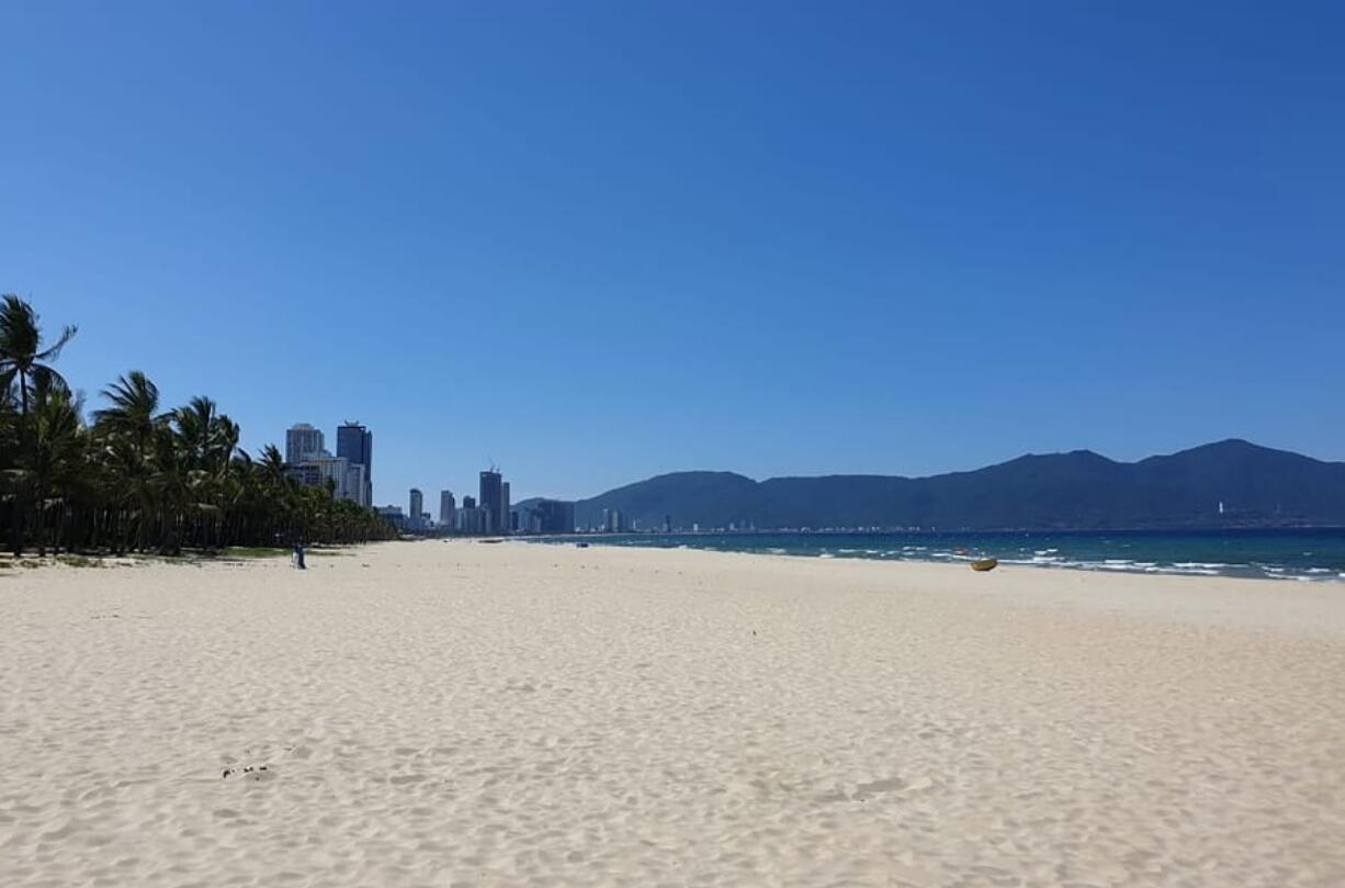 The once crowded beach is empty following a lockdown order in Da Nang, Vietnam, on Tuesday, July 28, 2020. Vietnam on Tuesday locked down its third-largest city for two weeks after more than a dozen cases of COVID-19 were found in a hospital.