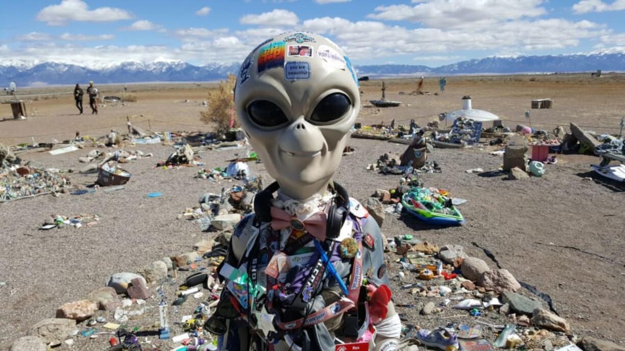 An alien statue overlooks a vortex field at the UFO Watchtower near Hooper, Colo.