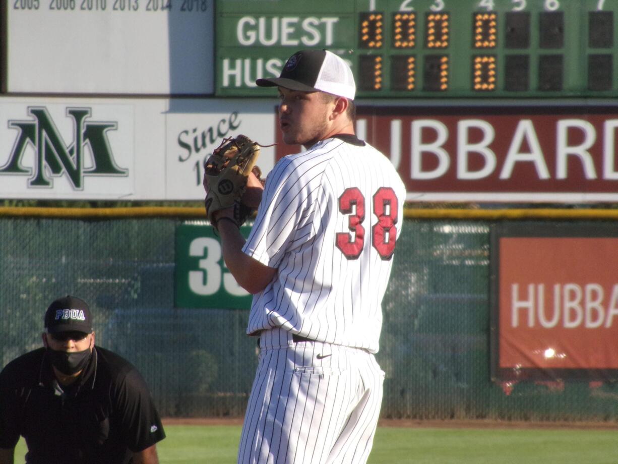 West Linn Knight pitcher Cooper Barnum, a Skyview High graduate, prepares to throw a pitch in the Wild Wild West League championship game on Sunday, Aug.