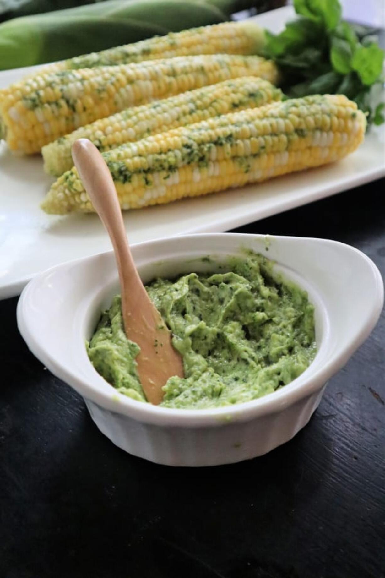 Basil butter dresses up corn on the cob and also brightens grilled meats and fish.