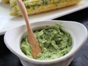 Basil butter dresses up corn on the cob and also brightens grilled meats and fish.