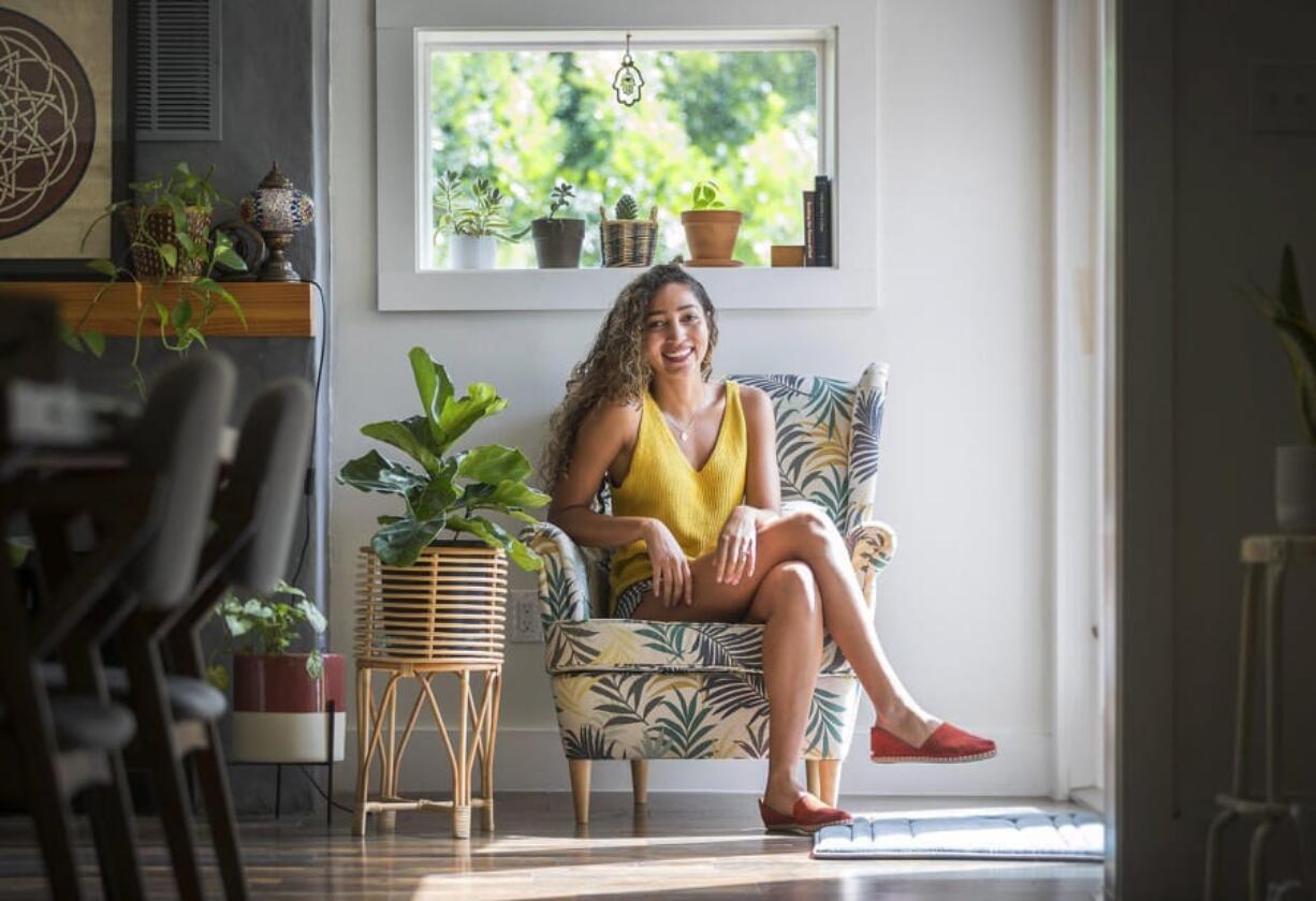 Aliyah Marandiz, pictured in her home last month, is a member of the local Baha&#039;i community. In the wake of recent protests against racism and police brutality, Marandiz says she has seen her fellow Baha&#039;i practice their core belief of eradicating racism through service to their community. (Ricardo B.