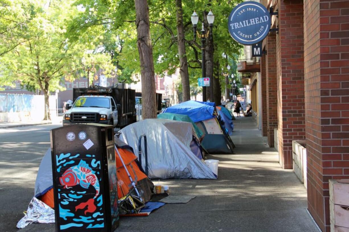 Tents line a sidewalk in Old Town on Aug. 25, 2020.